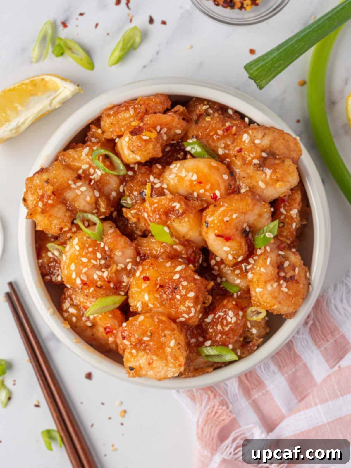 Blazing Burst Shrimp 2 Firecracker shrimp in a serving bowl with chopsticks, ready to be enjoyed.