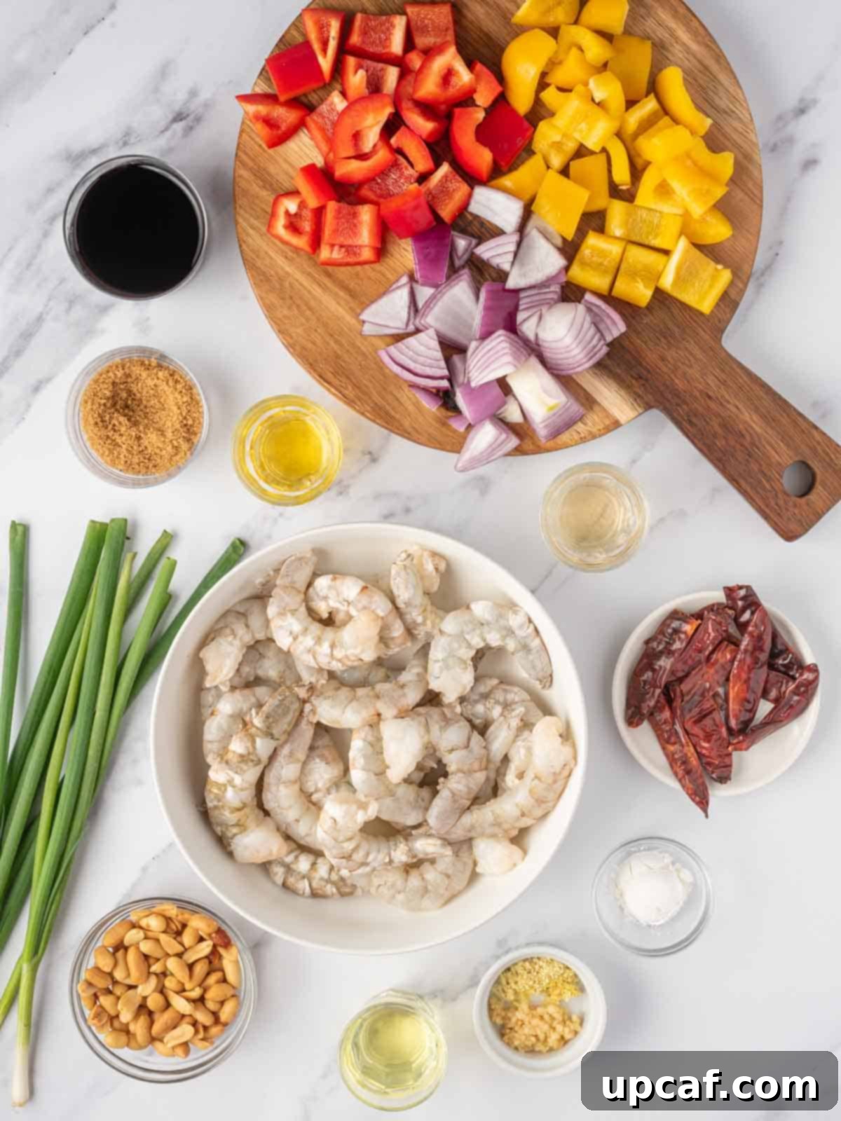 A visual display of all the ingredients needed to prepare the delicious Kung Pao Shrimp Recipe, neatly arranged.
