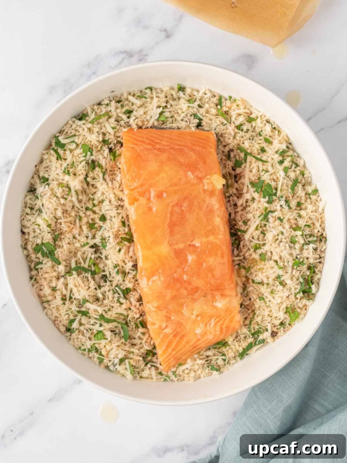 Process for coating the parmesan salmon.