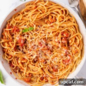 Hearty Chicken Ragu with Spaghetti 10 Ground chicken bolognese topped with parmesan cheese.