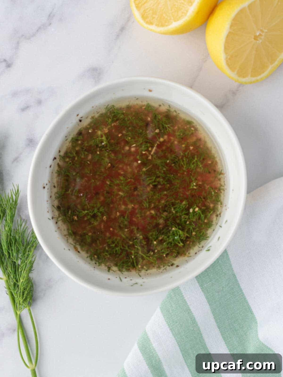 Greek chicken salad dressing in a bowl.