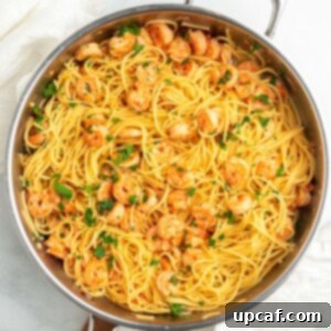 Garlic Parmesan Shrimp Spaghetti in a pan, ready for serving.