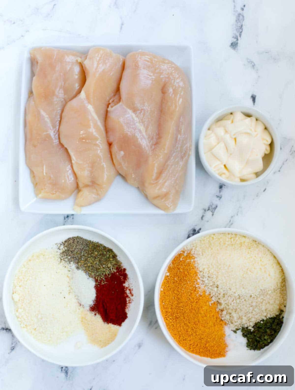 Ingredients needed for oven baked chicken cutlets.