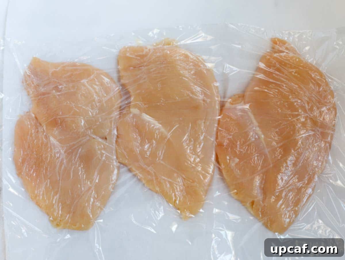 Pound the chicken cutlets to an even thickness.