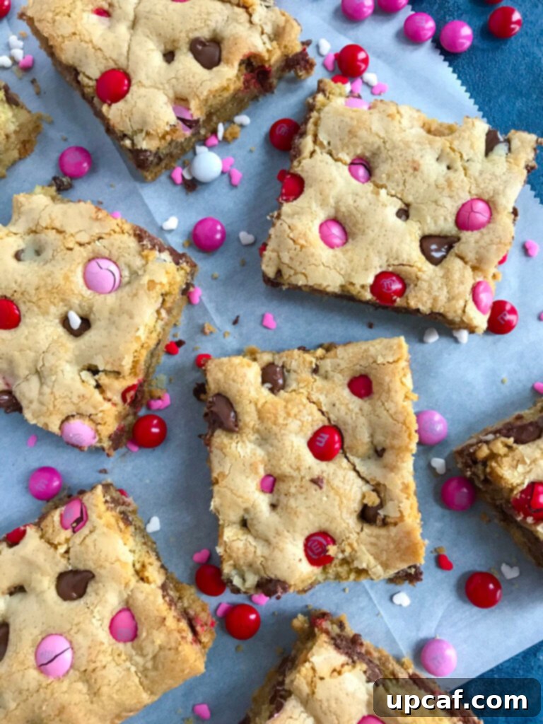 Freshly baked Valentine's M&M Chocolate Chip Cookie Bars, ready to be cooled and served.