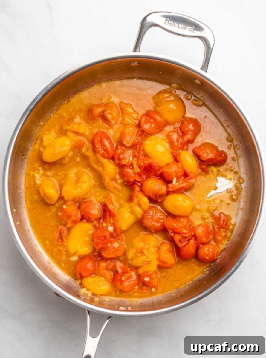 Bursting Cherry Tomato Pesto Pasta 5 cherry tomato sauce in a skillet