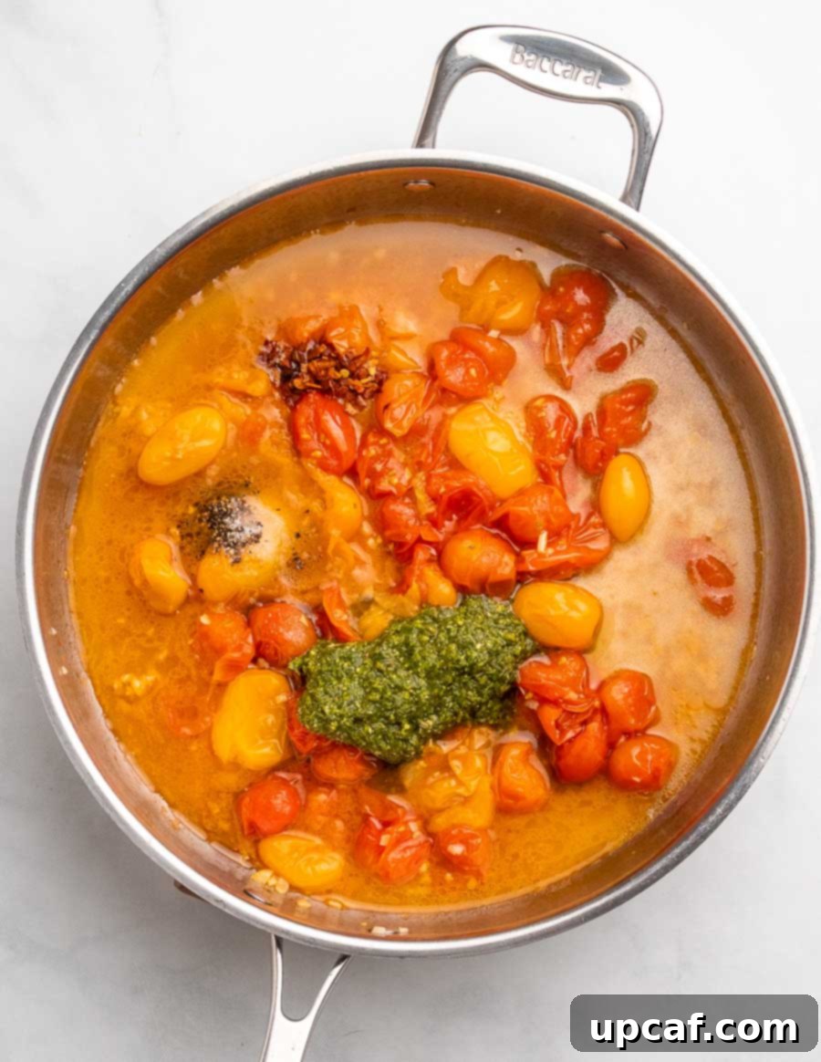 Bursting Cherry Tomato Pesto Pasta 6 tomato sauce with pesto and spices on top