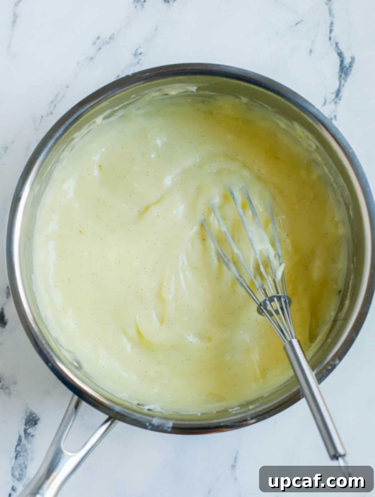 The Secret to Silky Crème Pâtissière 2 creme pattissiere in a pot.