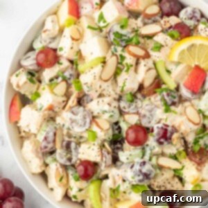 Our Family's Best Chicken Salad 9 Chicken salad in a bowl topped with slices of almonds.