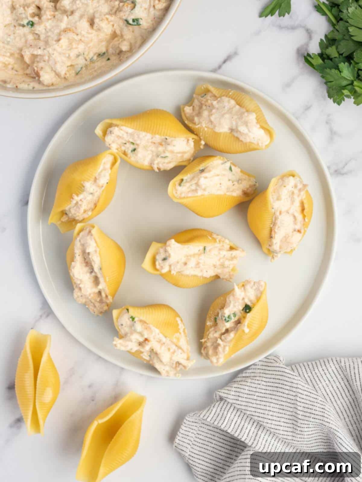 How to fill shells for cajun alfredo pasta.