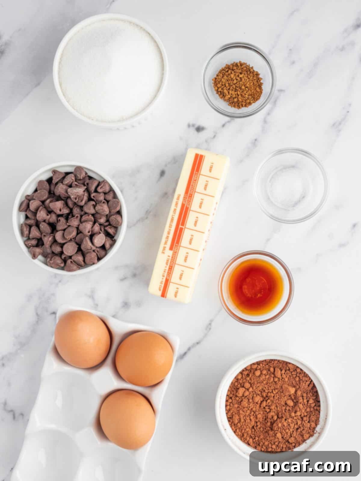 Velvet Chocolate Torte 3 A selection of high-quality ingredients arranged for making flourless chocolate torte.