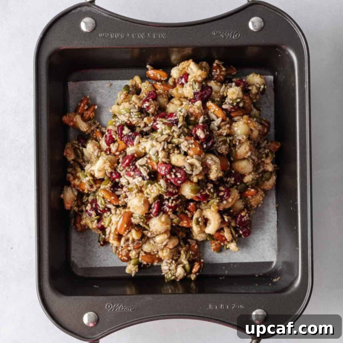 Seed and nut mixture in a parchment lined tray.