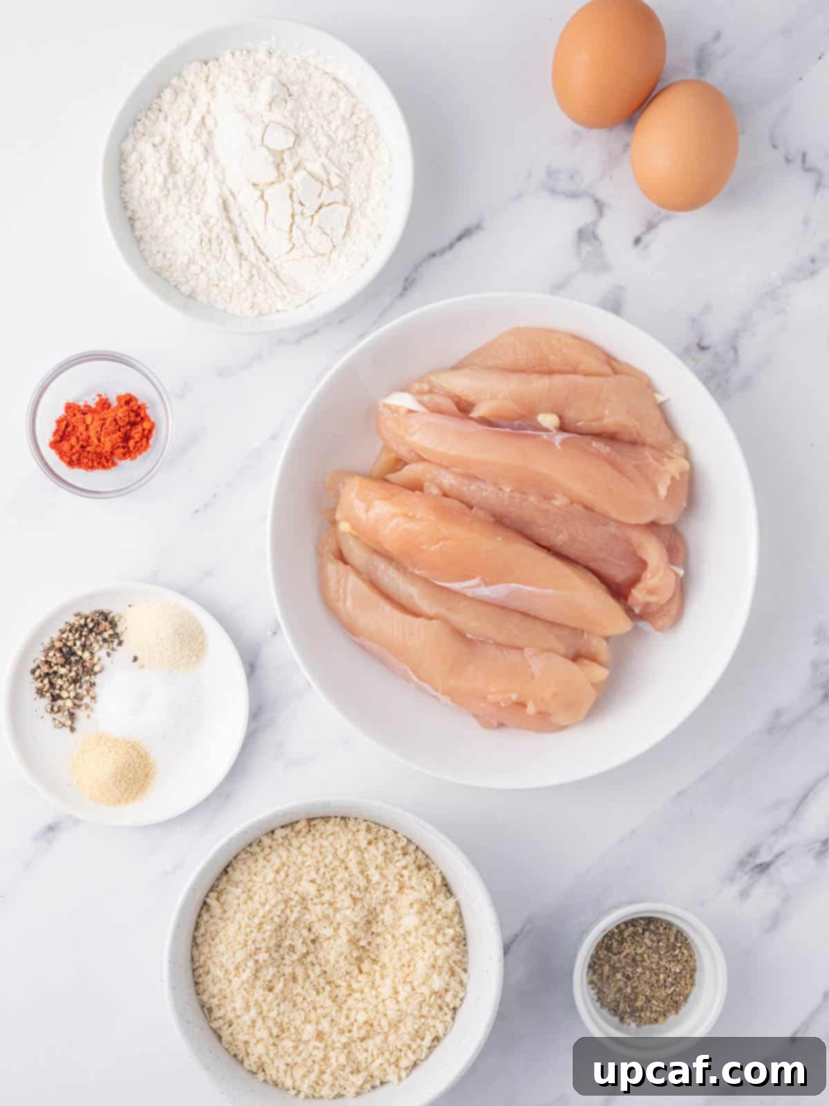 Ingredients needed for baked panko chicken tenders.