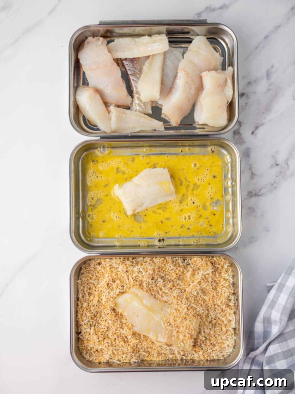 How to bread fish sticks using dredging stations.