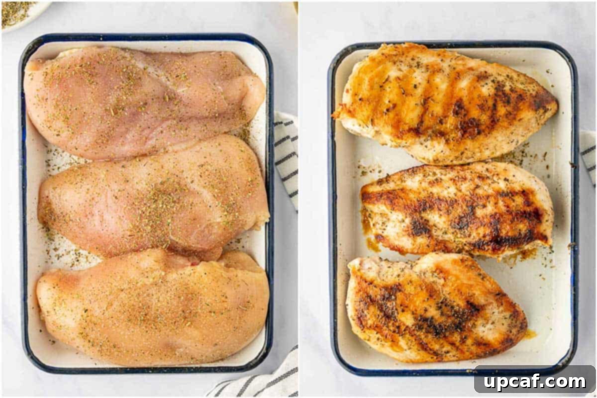 Grilled seasoned chicken breasts resting on a platter.