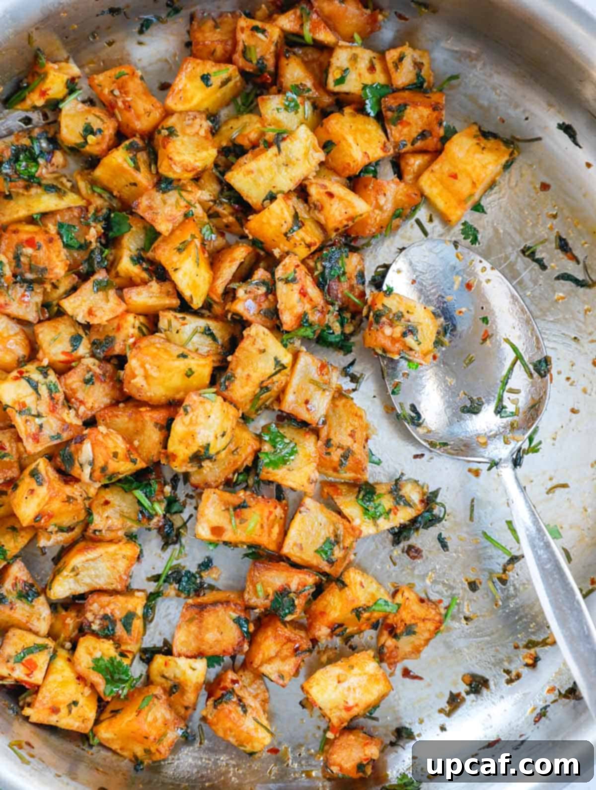 A close-up of Batata Harra, showcasing its vibrant color and crispy texture, ready to be enjoyed.