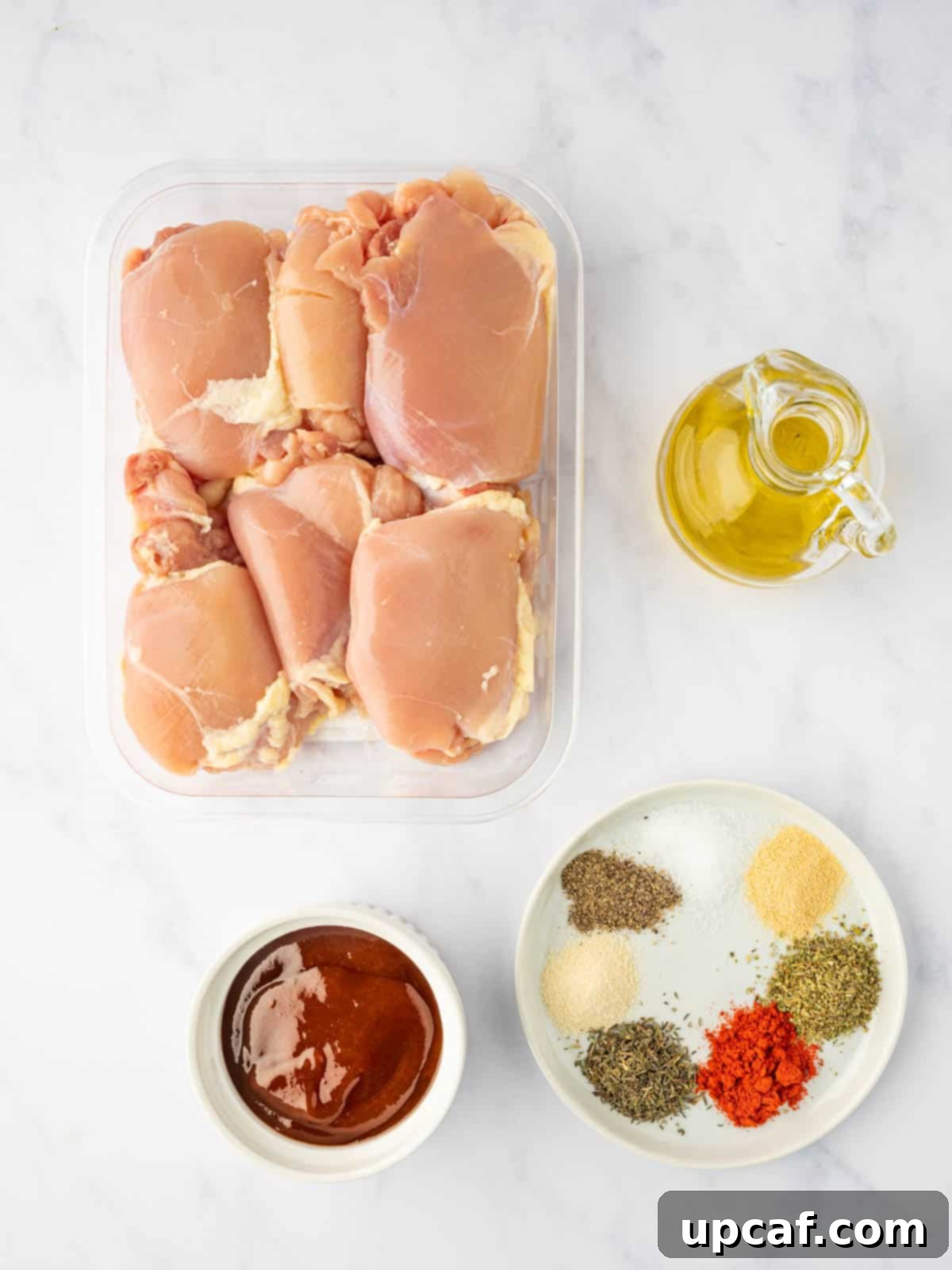 Perfectly Baked Boneless BBQ Chicken Thighs 3 Ingredients laid out for oven baked bbq chicken thighs.