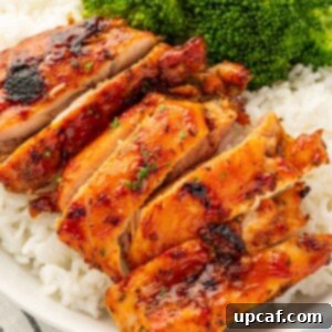 Perfectly Baked Boneless BBQ Chicken Thighs 9 BBQ chicken thighs with rice and broccoli.
