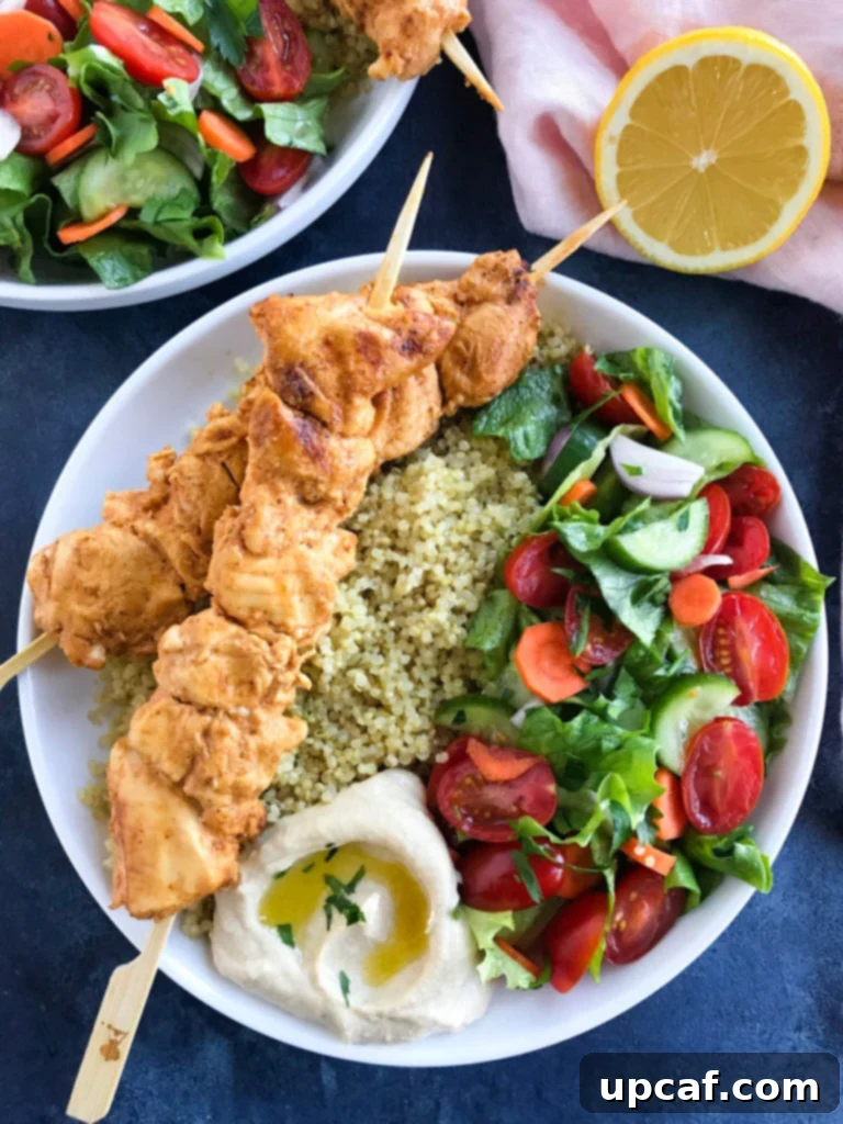 Shish Tawook Shish Tawook served with a fresh salad and quinoa