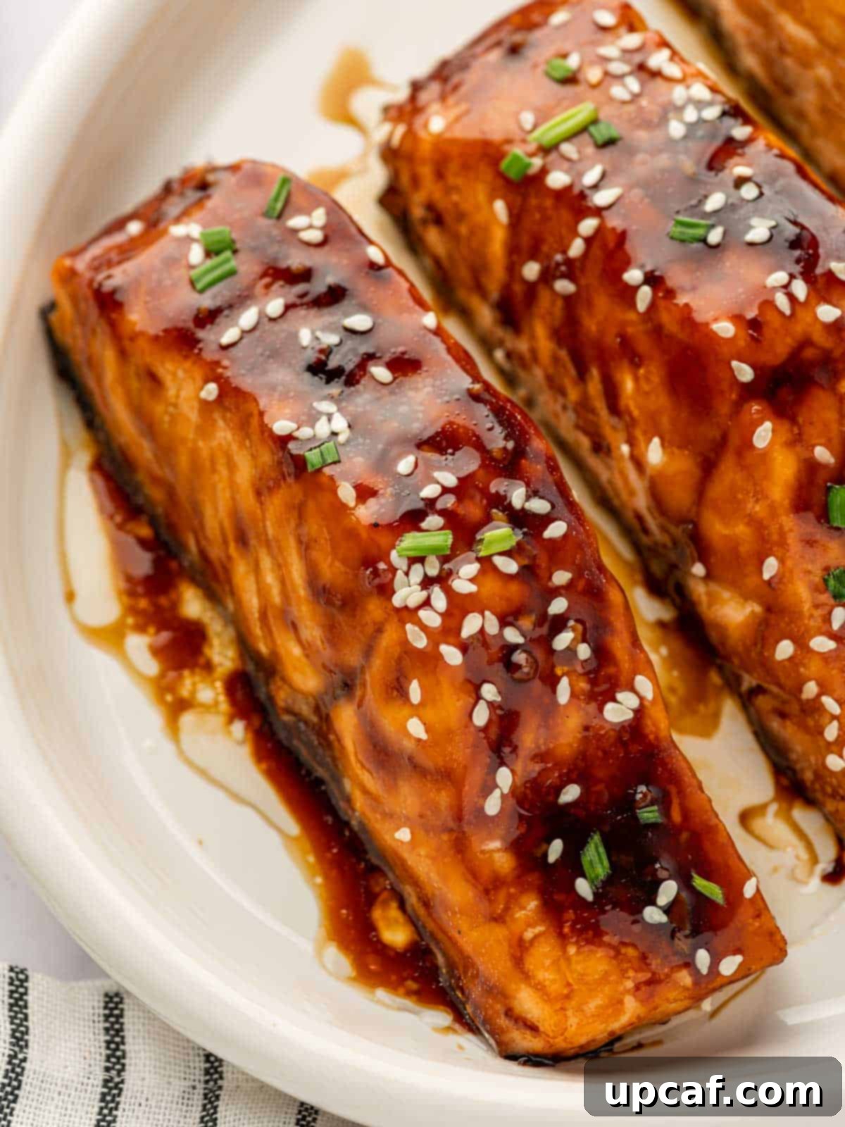 Close up of salmon with teriyaki glaze.