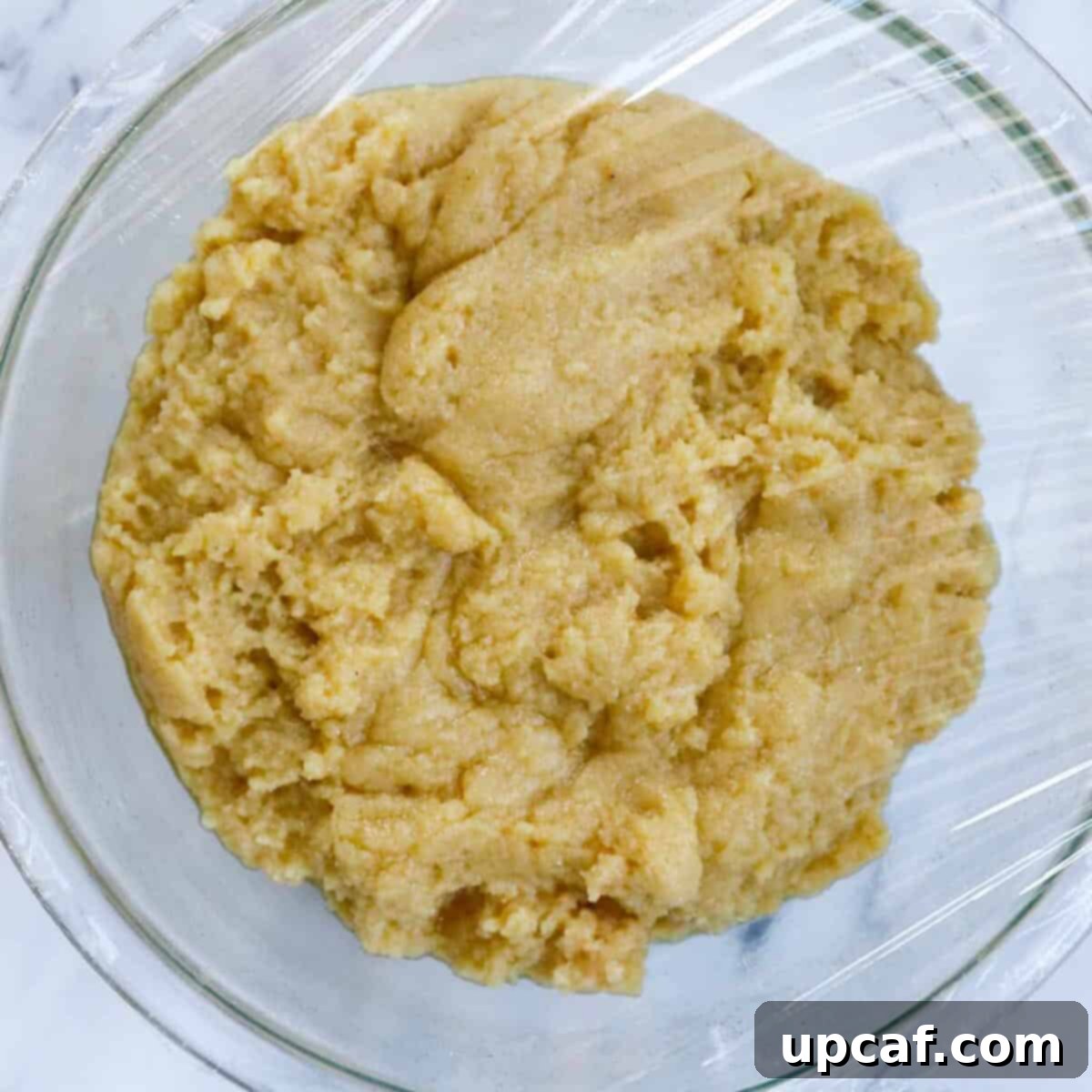 Maamoul dough in a bowl before final rest.