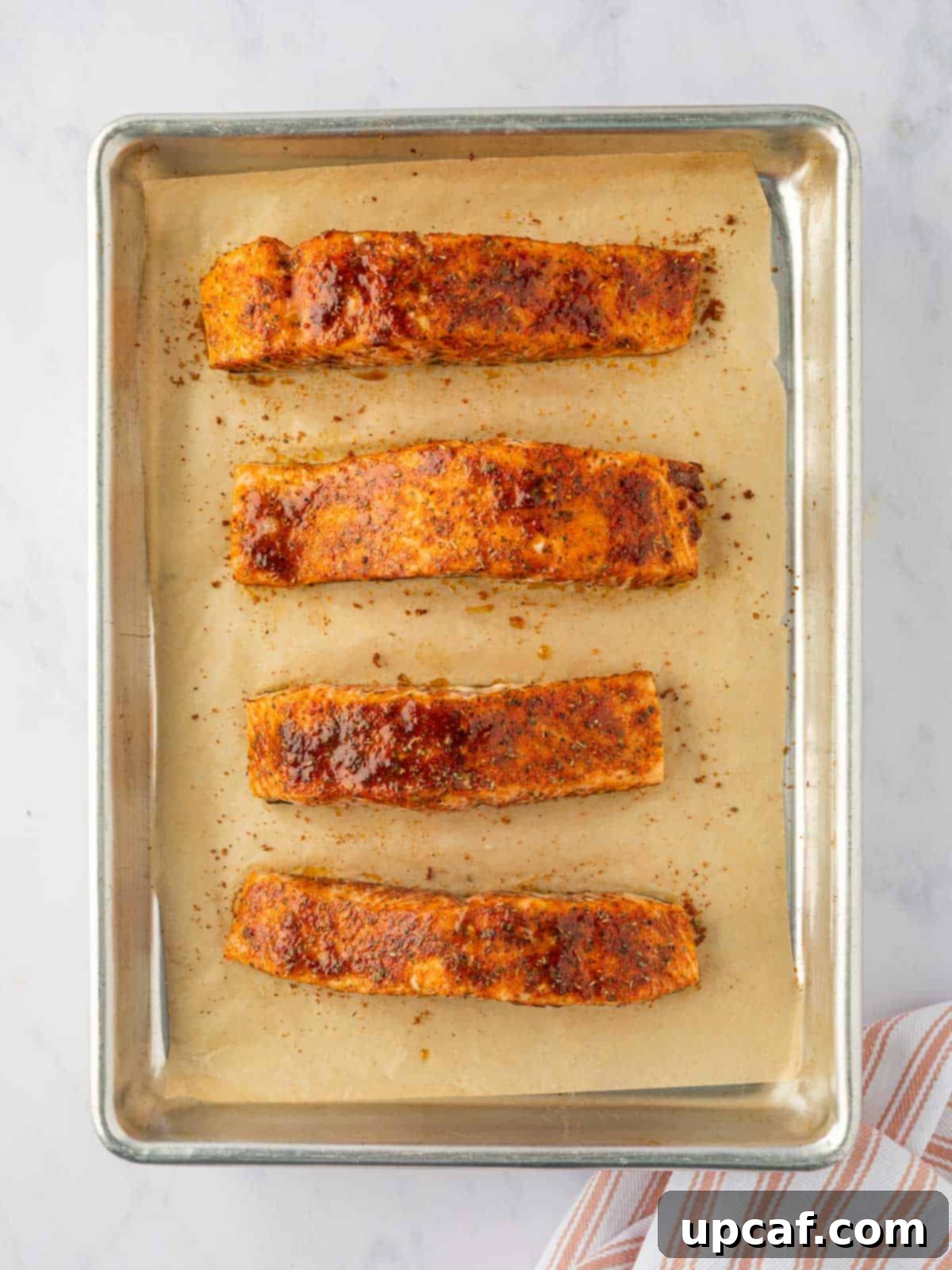 Caramelized Brown Sugar Salmon 6 Salmon on a baking tray.