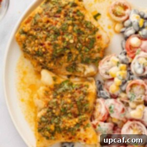 Finished cod fillets with herbs and lime, perfectly baked.