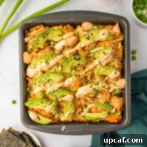 Baked salmon sushi roll in a pan.