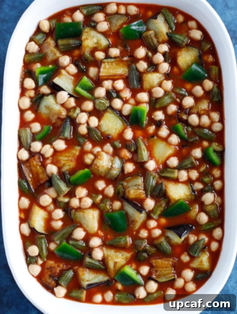 Maghmour in a white baking dish before being baked in the oven