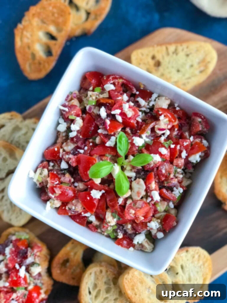 Vibrant Feta Bruschetta served on toasted crostini bread, ready to be enjoyed.