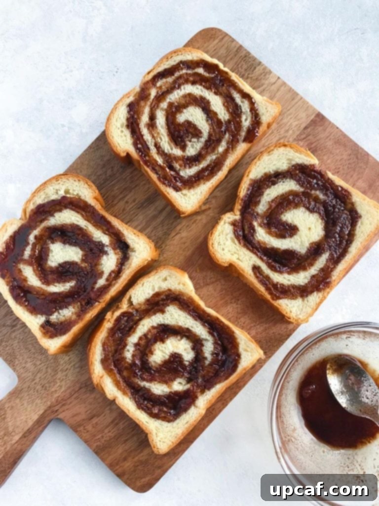 Marbled Cinnamon French Toast 2 Close-up of brioche bread slices with homemade cinnamon sugar paste swirled onto their surface.