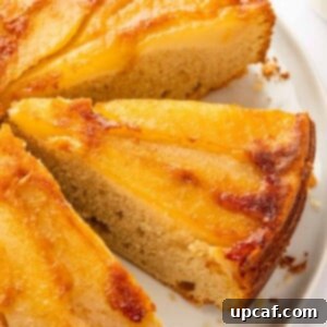 Caramelized Pear Crown Cake 18 Slices of upside down pear cake on a plate.