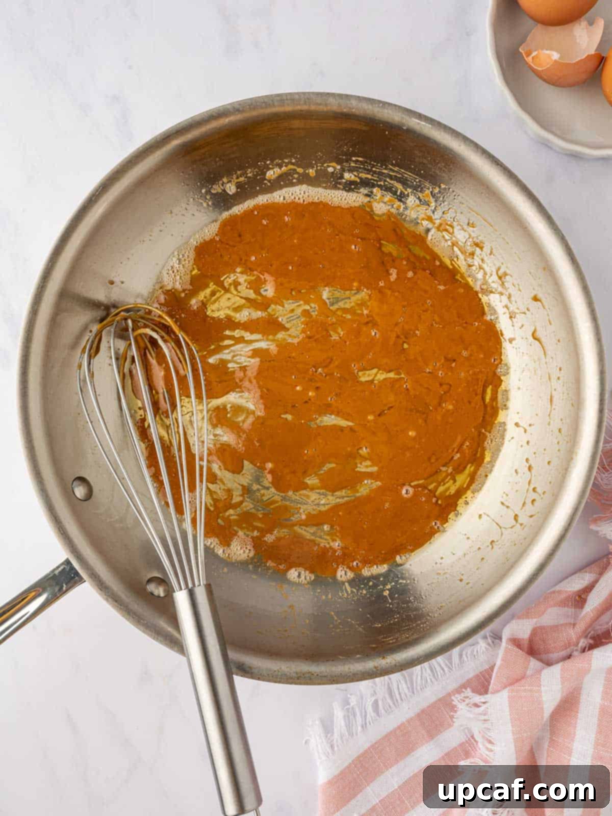 Caramelized Pear Crown Cake 5 Smooth caramel sauce in a skillet, ready for the cake pan.