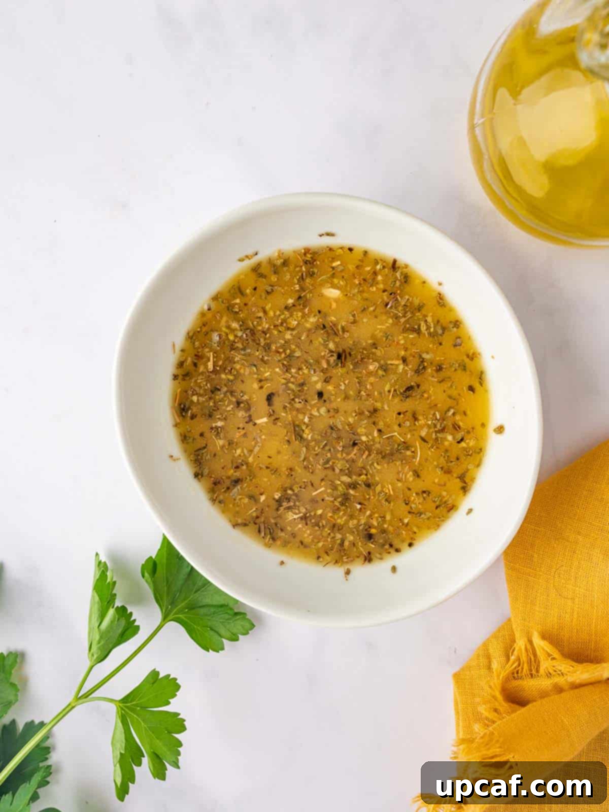 A bowl of vinaigrette for bean salad.