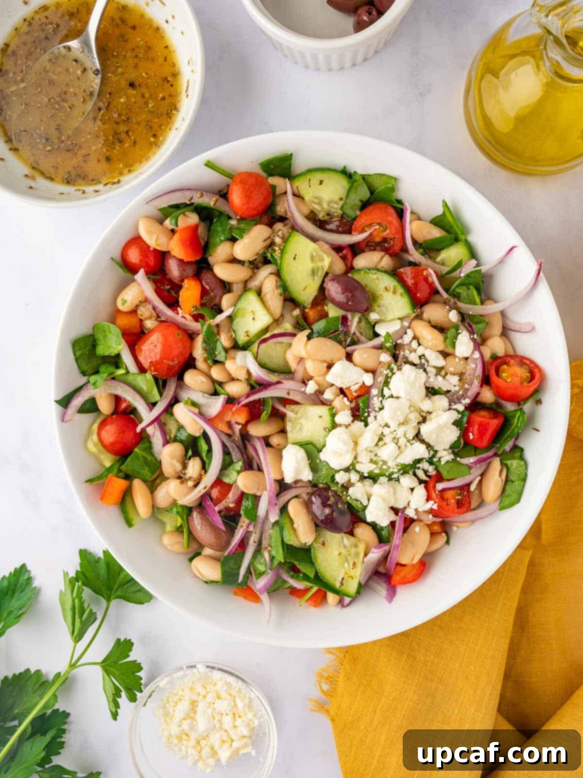 Added feta cheese to the bean salad bowl.