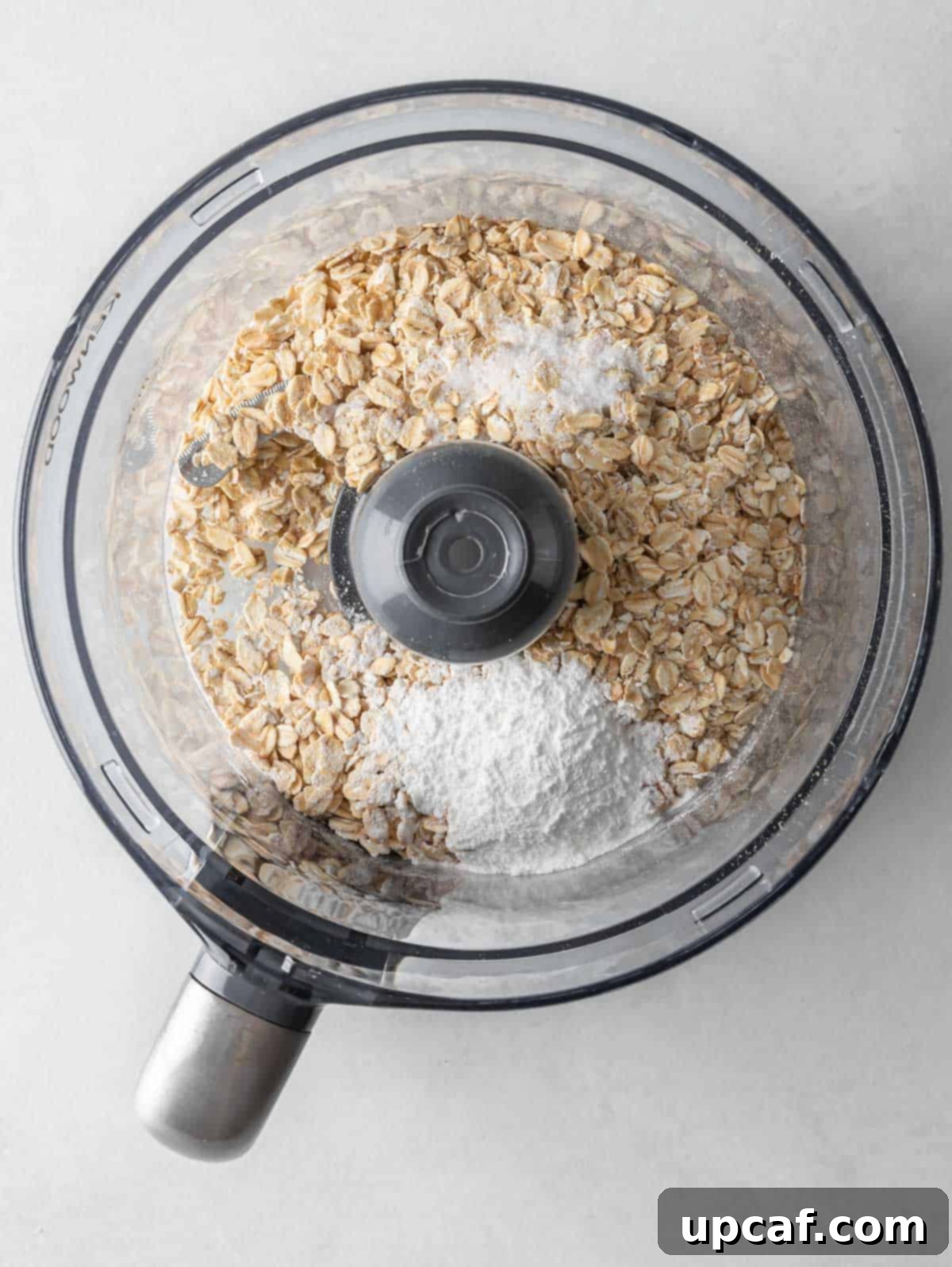 Ultimate Chocolate Protein Stacks 4 Pancake process shot with oatmeal and other ingredients in a food processor.