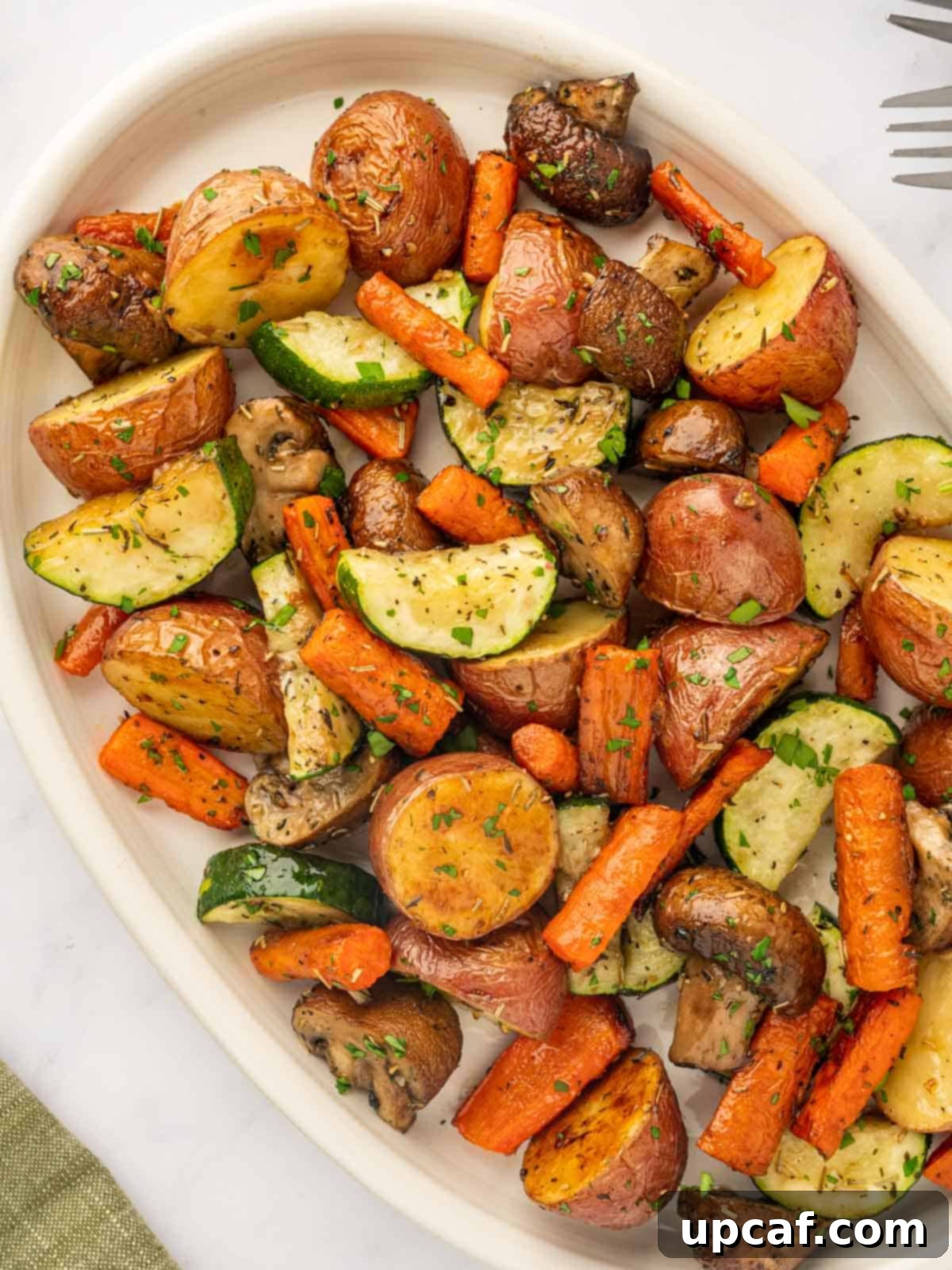 Oven roasted veggies on a platter, ready to be served.