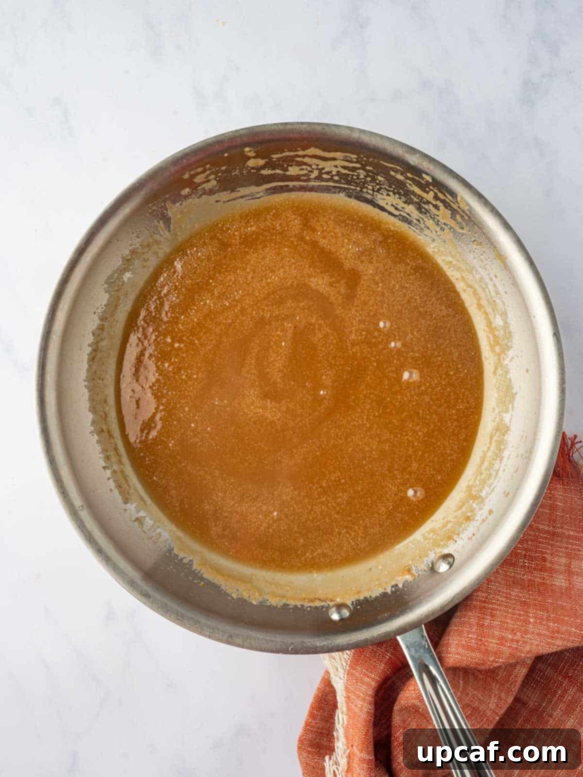 Making the caramel sauce.