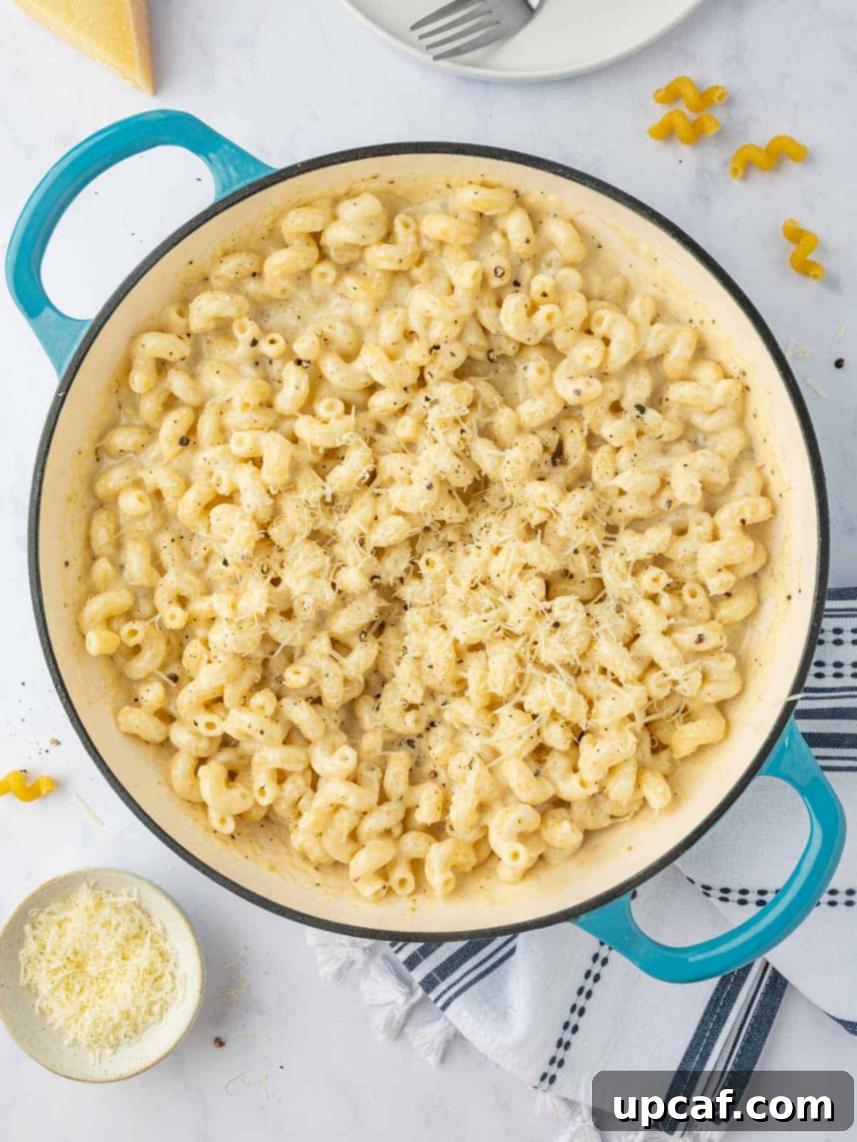 A post of homemade cheesy pasta.