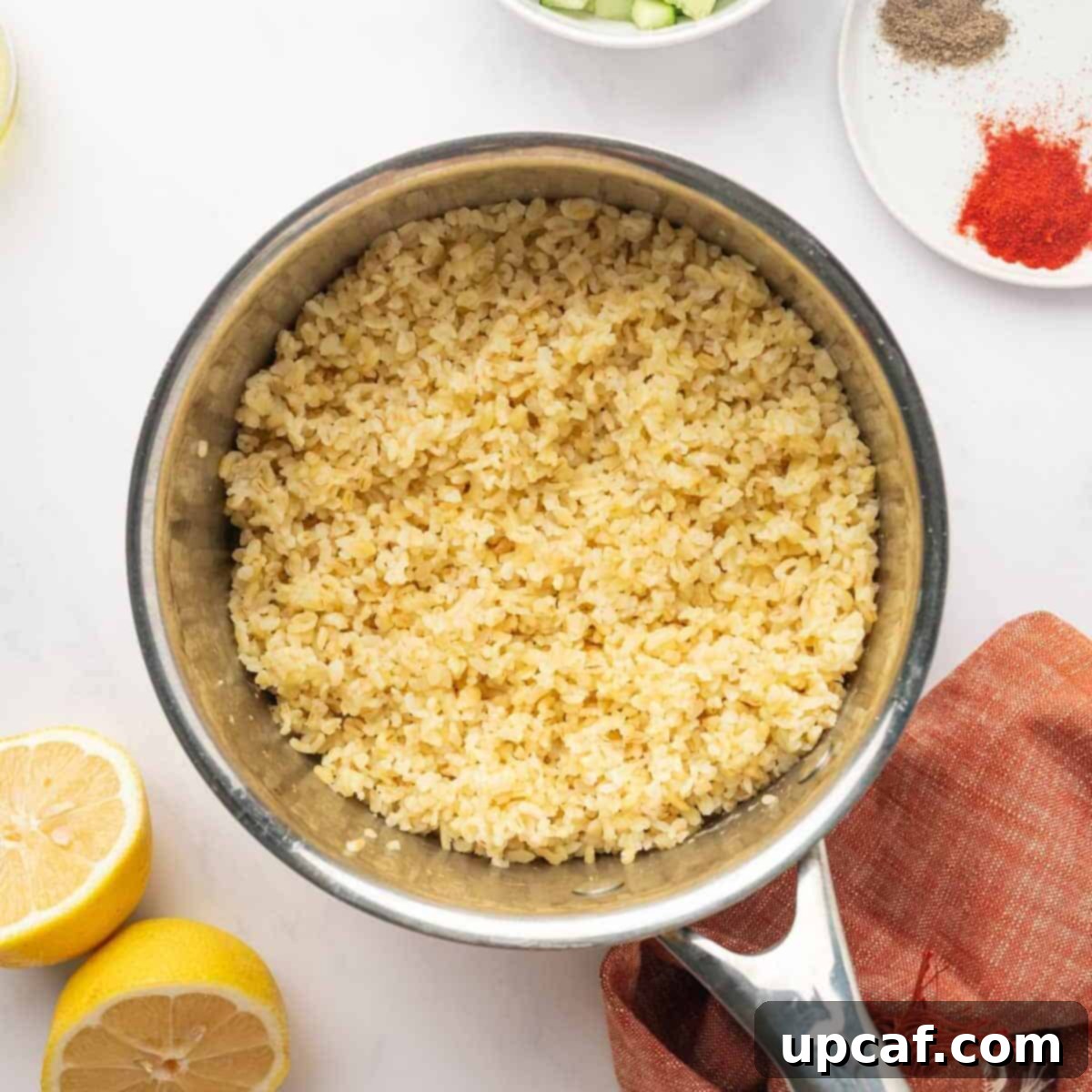 Step 2: Cooked bulgur wheat in a pot with the lid off, showing fluffy grains.