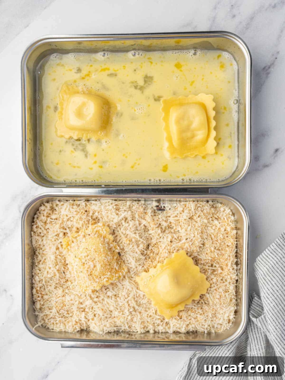 Process for coating ravioli with breading.