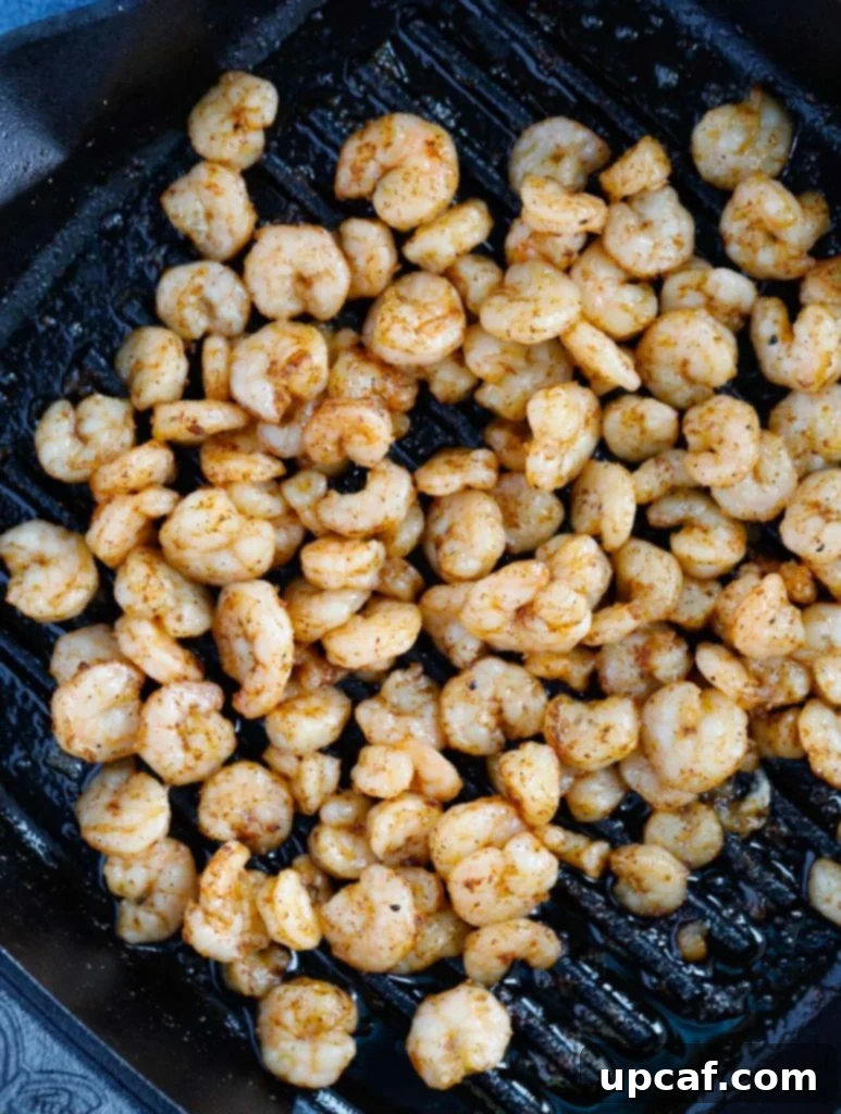 Pan-seared baby shrimp for Southwest Quinoa Salad