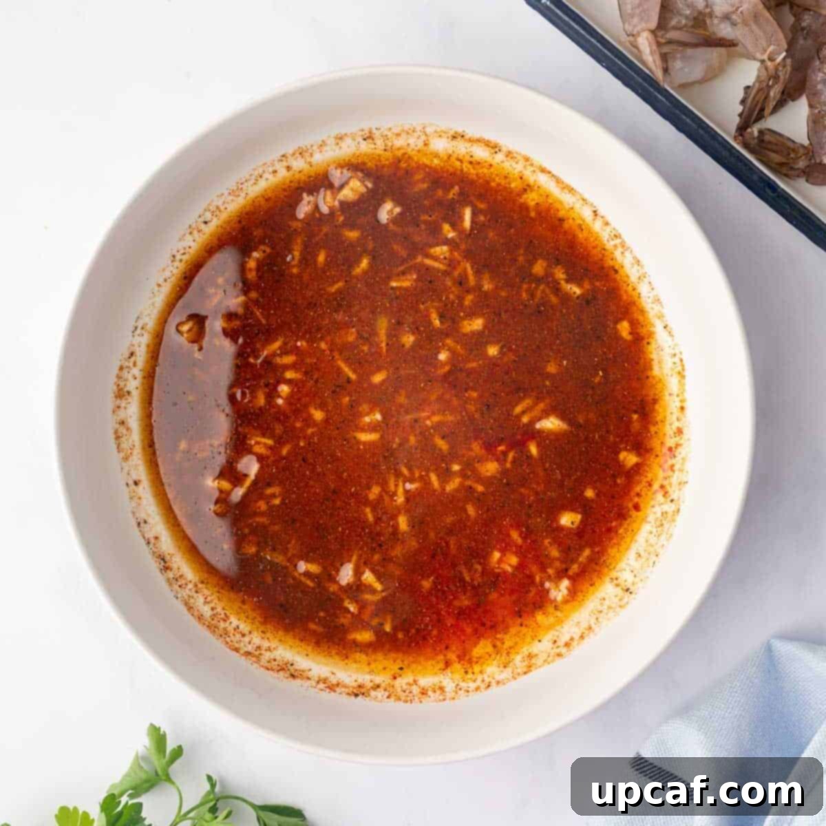 Fiery Cajun Grilled Shrimp 4 Grilled cajun shrimp marinade in a bowl.