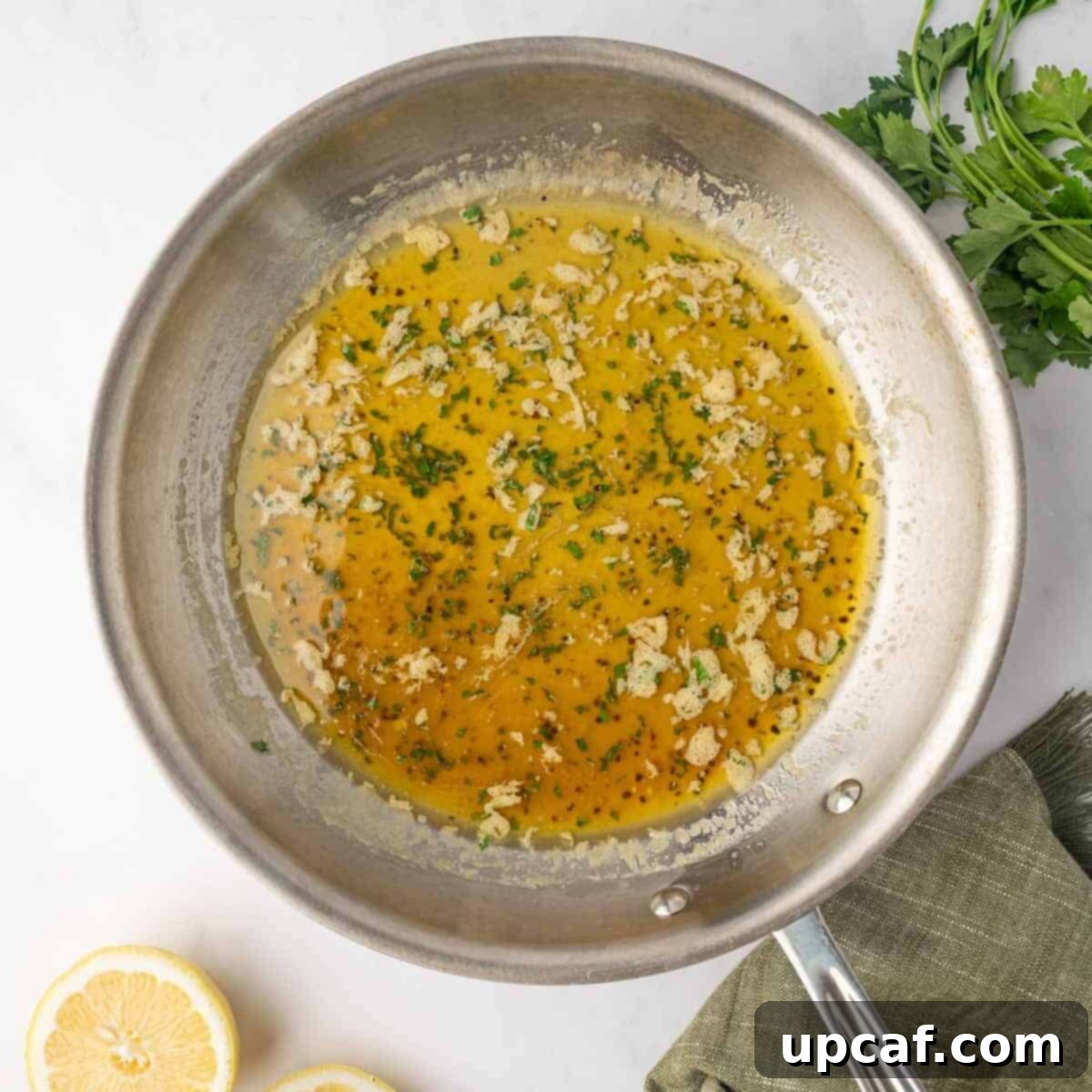 Honey-Glazed Lemon Pepper Wings 6 Honey lemon pepper sauce is prepared in a skillet.