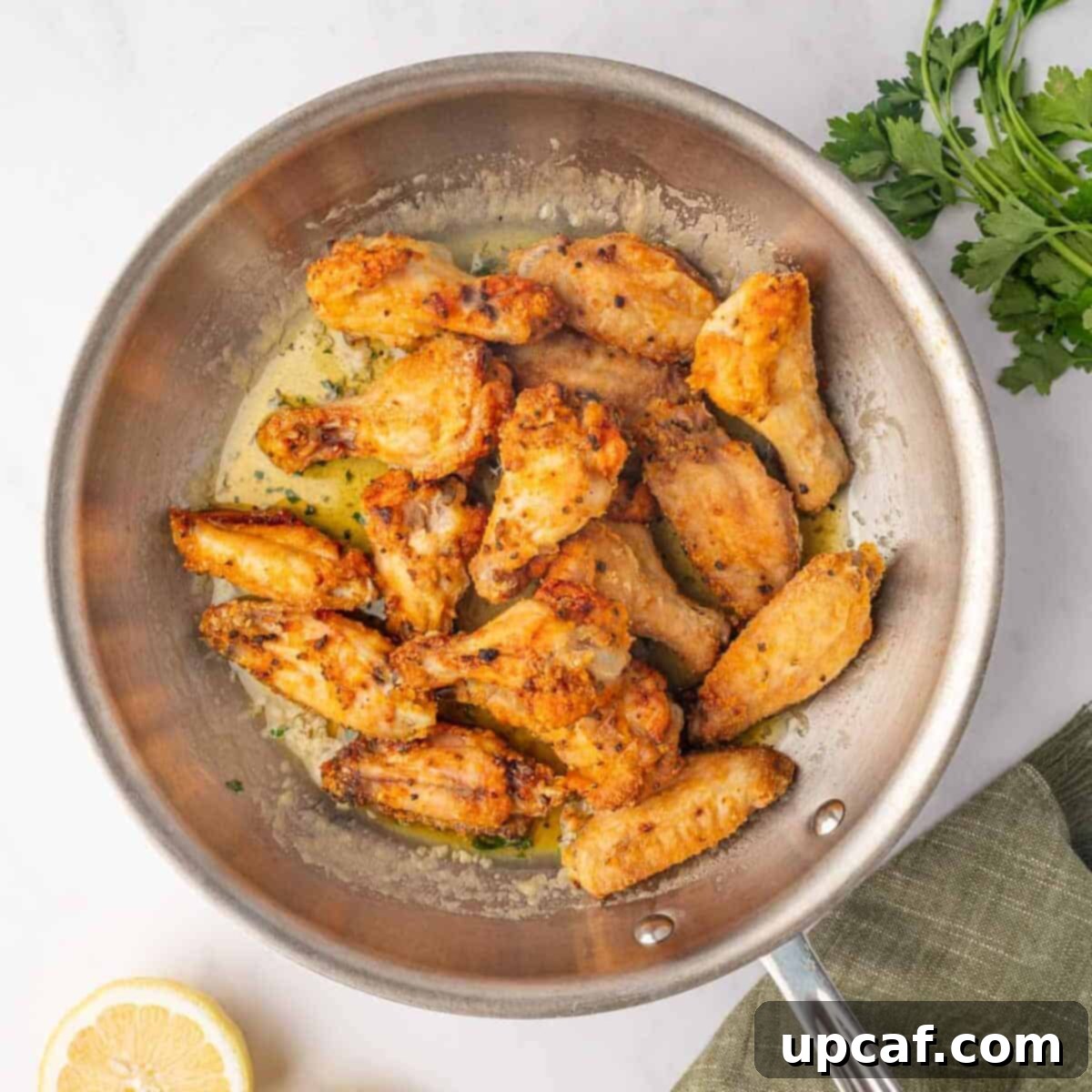 Honey-Glazed Lemon Pepper Wings 7 Baked chicken wings are tossed with honey lemon pepper sauce.