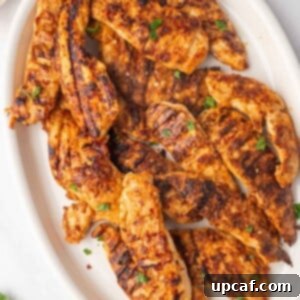 Fiery Peri Peri Chicken 11 Grilled peri peri chicken on a platter.