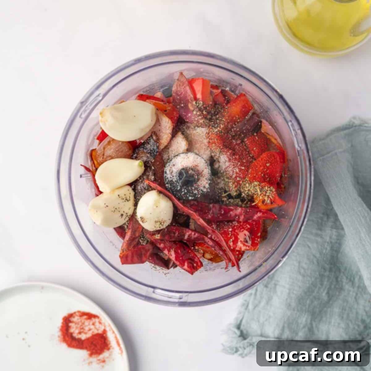 Fiery Peri Peri Chicken 5 All the marinade ingredients are combined in a food processor, ready to be blended into a smooth sauce.