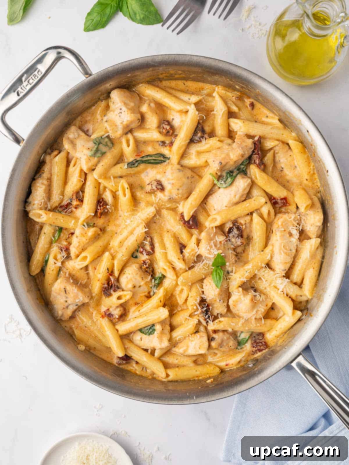 Marry Me Chicken Pasta, a creamy and flavorful dish, served in a skillet.