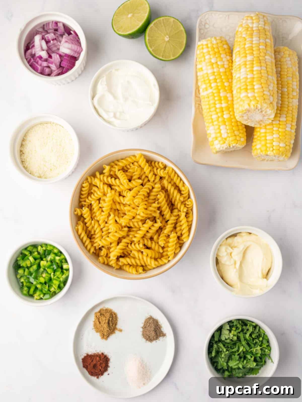 Ingredients needed for street corn pasta salad.