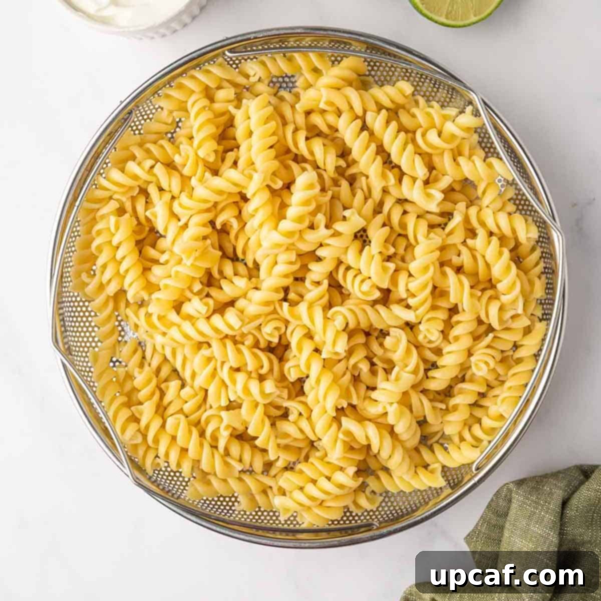 Cooke pasta in a colander.